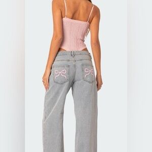 Edikted Bow Pocket Relaxed Jeans. Embroidered bows.